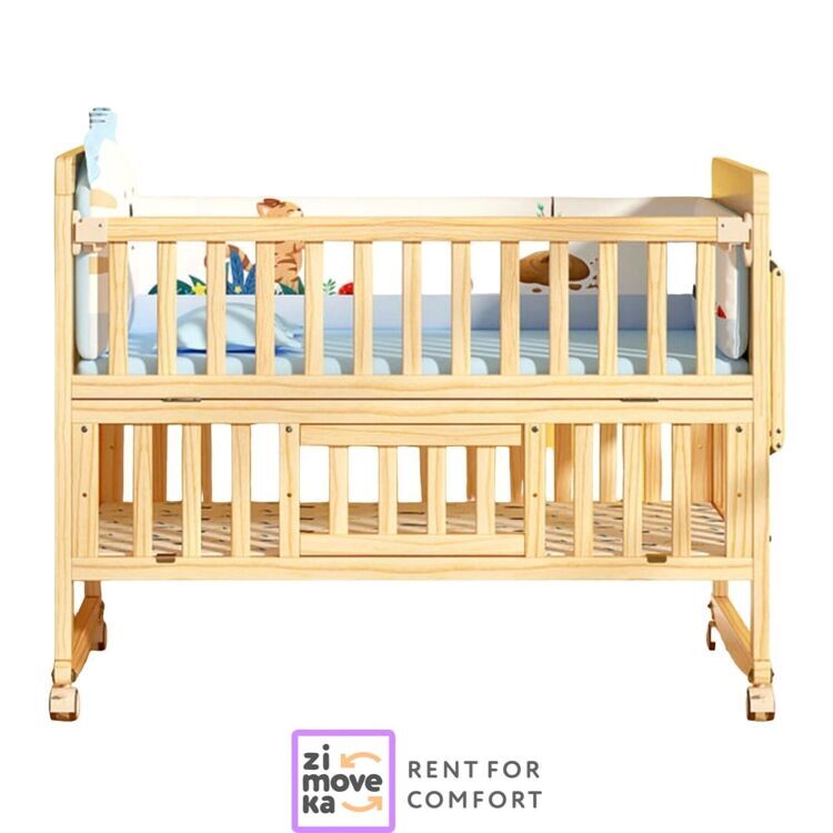 Wooden crib with mattress