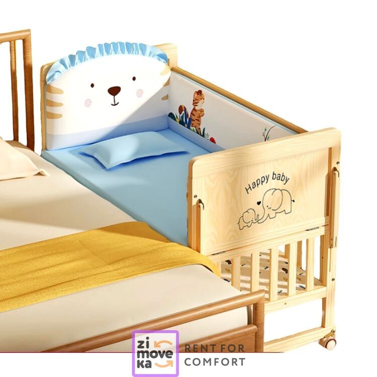 Wooden crib with mattress