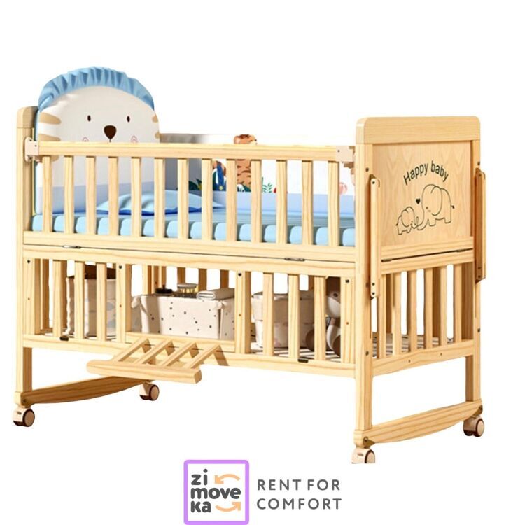 Wooden crib with mattress